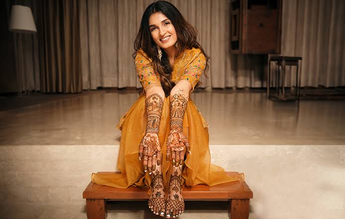 Enhance Your Haldi Look with Silver Maang Tikka and Yellow Saree for Haldi