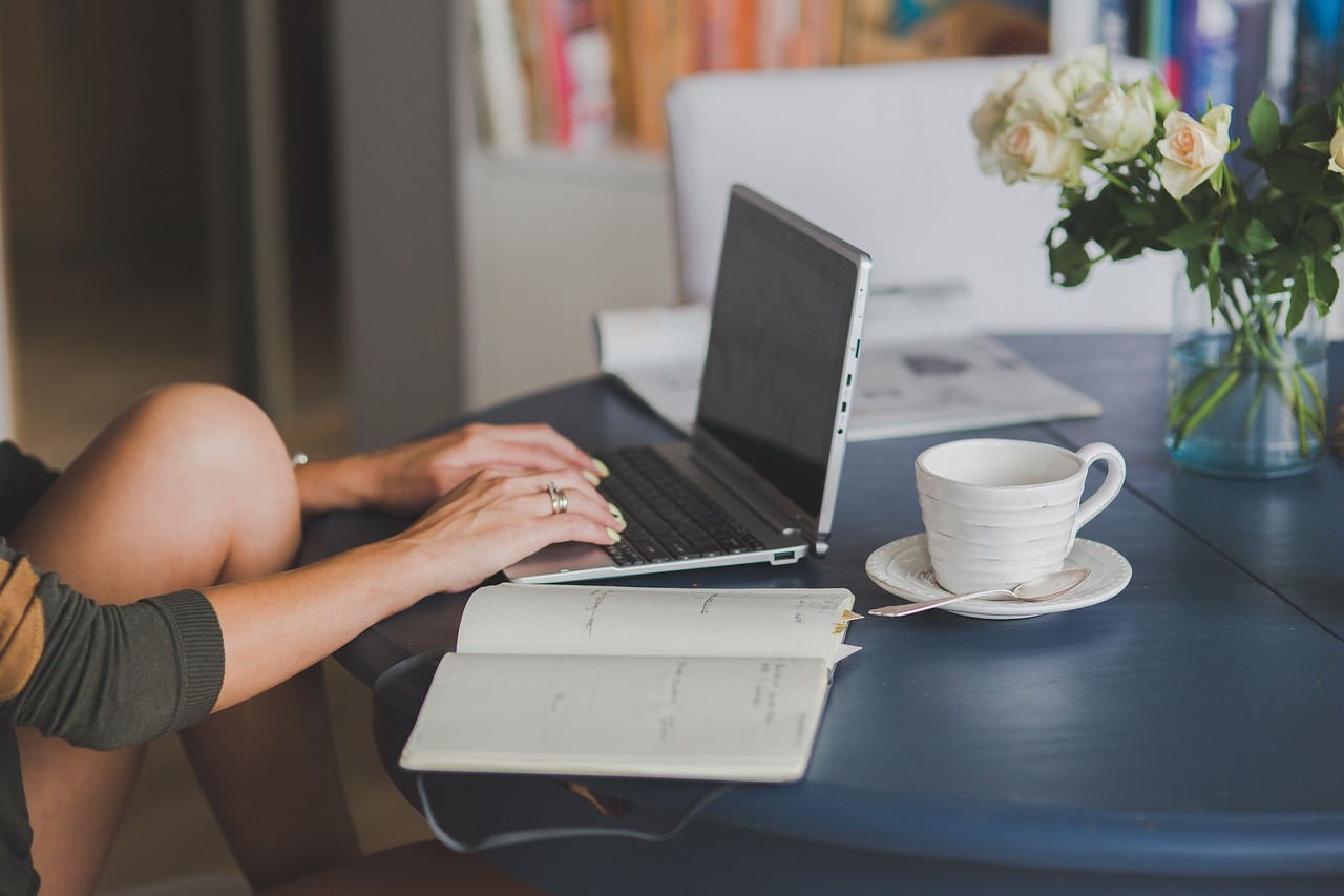 Laptop, workstaion, office — Exploring the Process of Downloading MT4 for Seamless Forex and CFD Trading